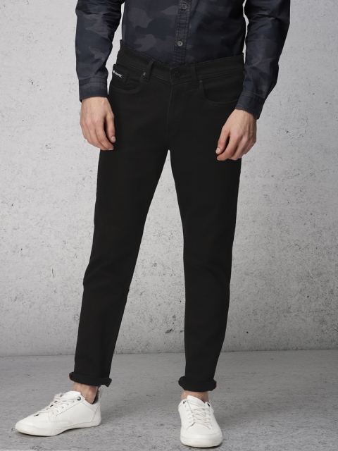 

Ecko Unltd Men Black Slim Tapered Fit Mid-Rise Clean Look Stretchable Jeans