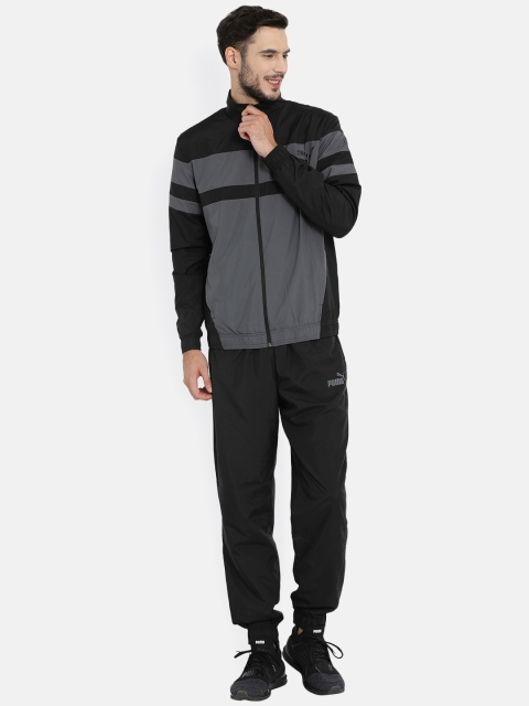 

Puma Men Black & Charcoal Grey Regular Fit Colourblocked Woven Track Suit