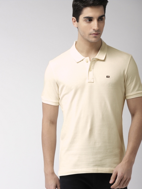 

Arrow Sport Men Off-White Solid Polo Collar T-shirt
