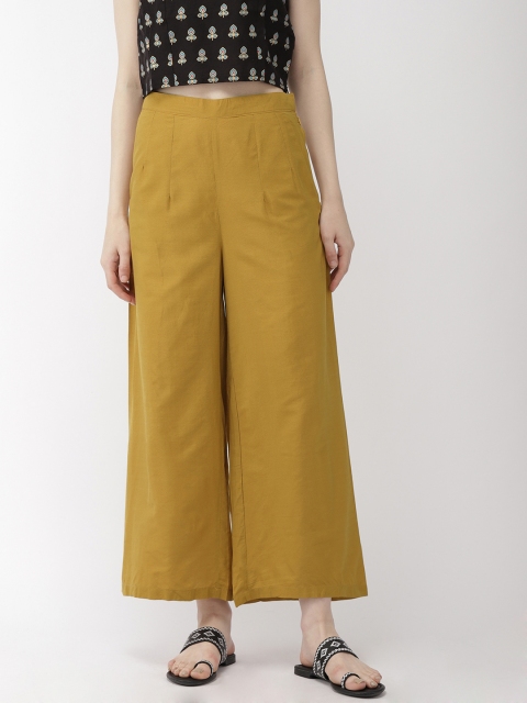 

Go Colors Women Mustard Yellow Solid Flared Palazzos