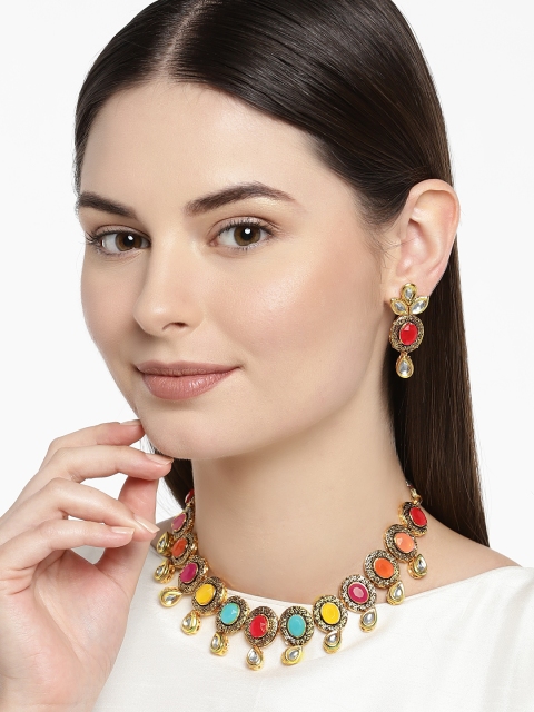

Zaveri Pearls Women Gold-Plated & Red Antique Jewellery Set