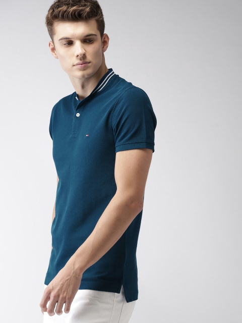 

Tommy Hilfiger Men Teal Blue Solid Polo Collar T-shirt