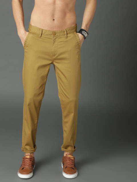 

Roadster Men Khaki Regular Fit Self Design Regular Trousers