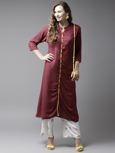 

Moda Rapido Women Maroon & White Solid Kurta with Palazzos