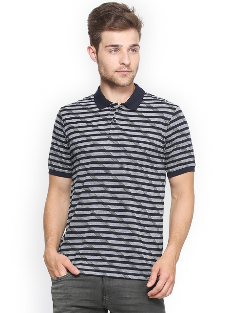 

Peter England Casuals Men Navy Blue Self Design Polo Collar T-shirt