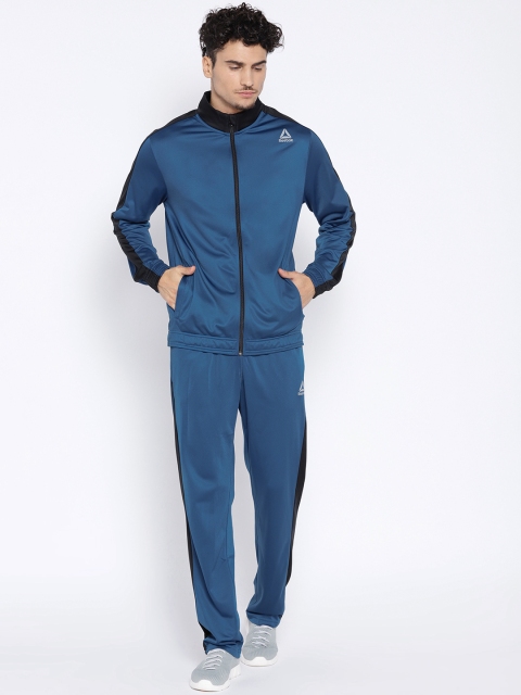 

Reebok Men Blue Solid TRICOT Training Tracksuit