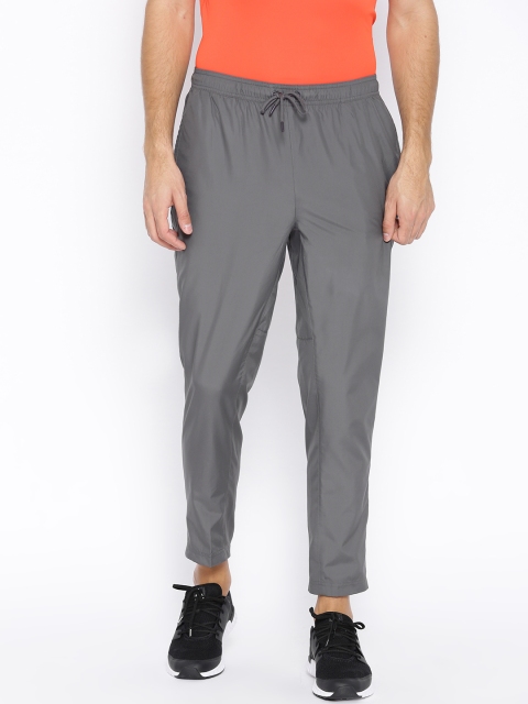 

Reebok Men Grey WOR Woven Solid Track Pants
