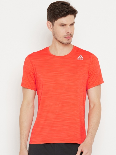 

Reebok Men Orange Solid Slim Fit AC Running T-shirt