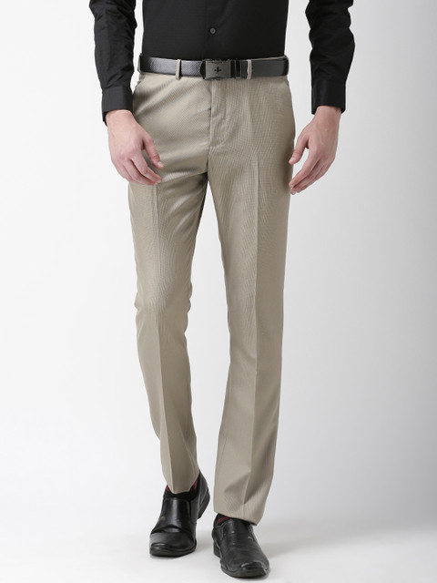 

Arrow New York Men Beige Tapered Fit Solid Formal Trousers
