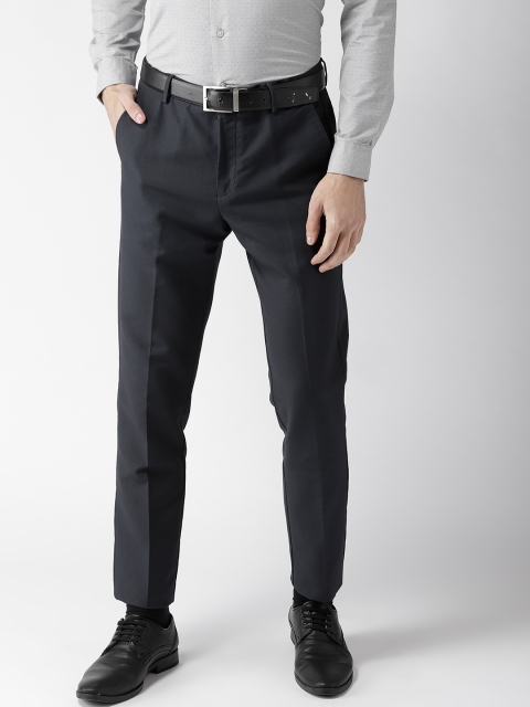 

Arrow Men Navy Blue Solid Tapered Fit Regular Trousers