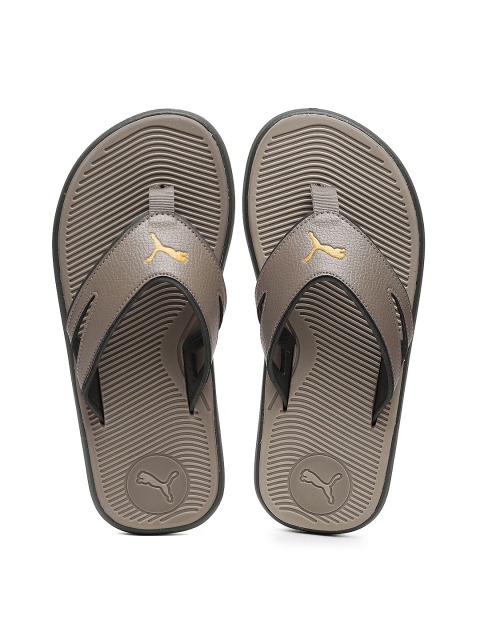 

Puma Men Brown Solid Thong Flip Flops