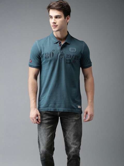 

Flying Machine Men Blue Solid Polo Collar T-shirt