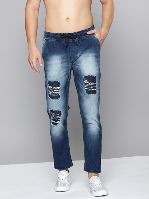 

Kook N Keech Marvel Men Blue Mid-Rise Slim Jogger Fit Mildly Distressed Stretchable Jeans