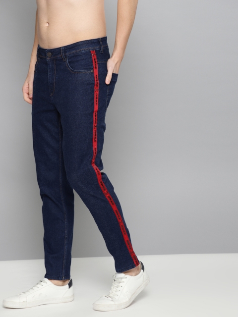 

Kook N Keech Marvel Men Blue Carrot Fit Mid-Rise Clean Look Stretchable Jeans