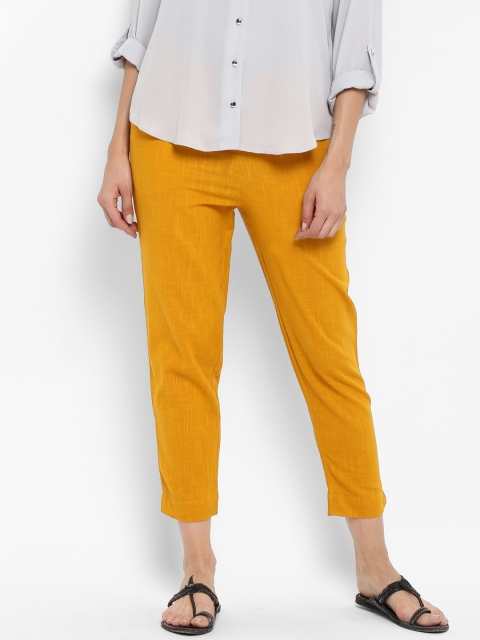 

Sringam Women Mustard Yellow Solid Cropped Trousers