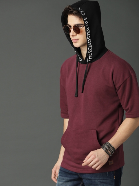 

Roadster Men Burgundy Solid Hooded Sweatshirt