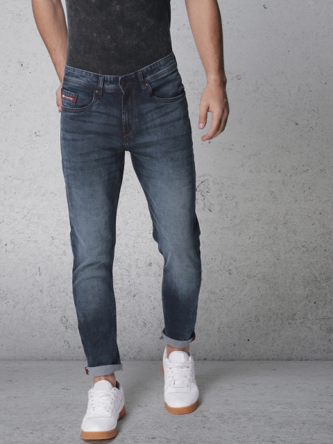 

Ecko Unltd Men Blue Tapered Fit Mid-Rise Clean Look Stretchable Jeans
