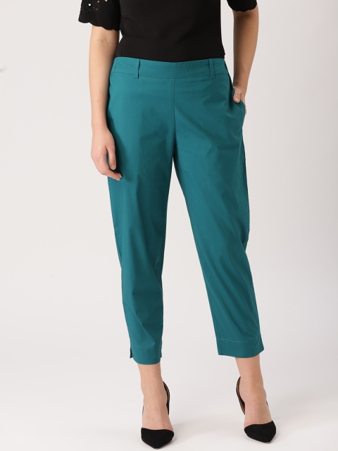 

Libas Women Teal Blue Straight Fit Solid Regular Cropped Trousers