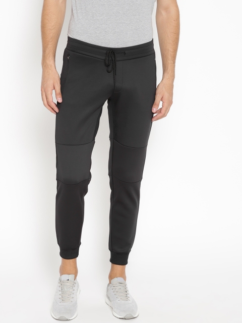 

ether Men Black Solid Joggers