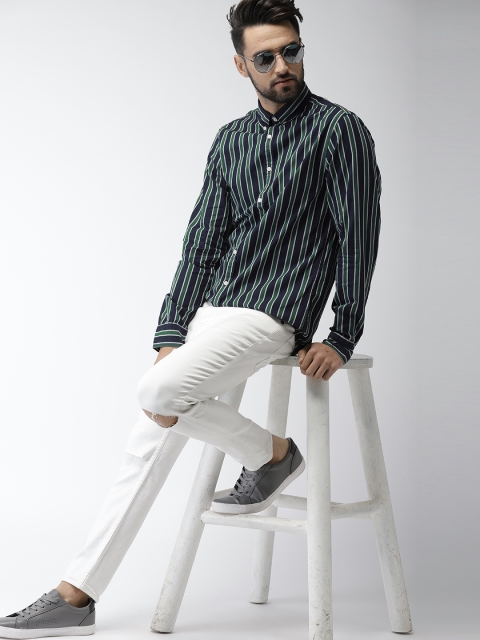 

Tommy Hilfiger Men Navy Blue & Green Regular Fit Striped Casual Shirt