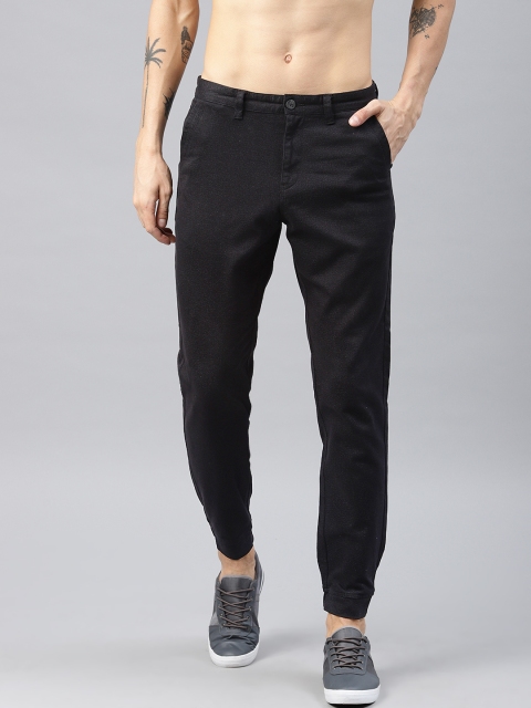 

HRX by Hrithik Roshan Men Black Solid Jogger Trousers