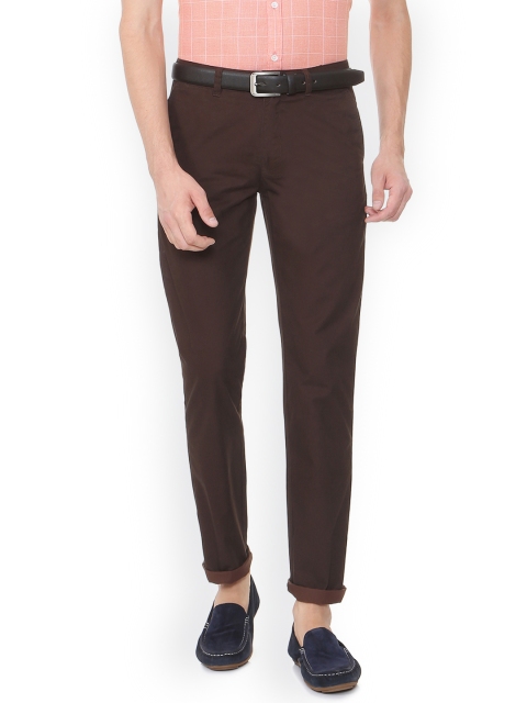 

Peter England Casuals Men Brown Slim Fit Self Design Regular Trousers