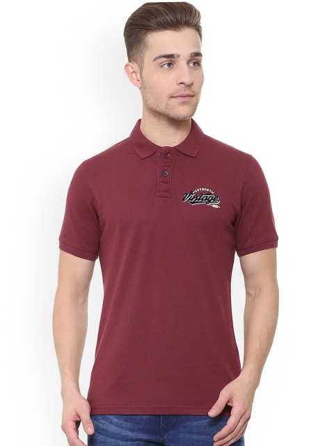 

Peter England Casuals Men Maroon Solid Polo Collar T-shirt