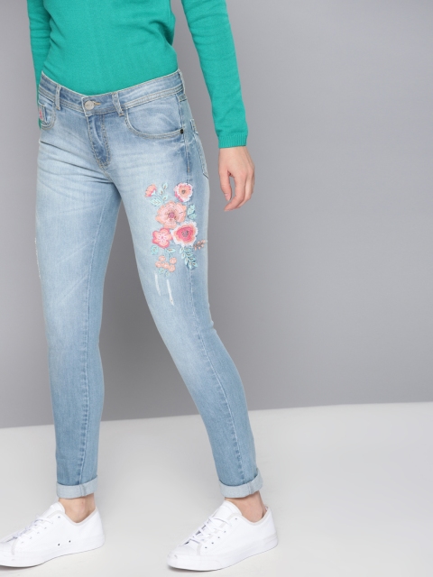 

NUSH Women Blue Regular Fit Mid-Rise Low Distress Stretchable Jeans