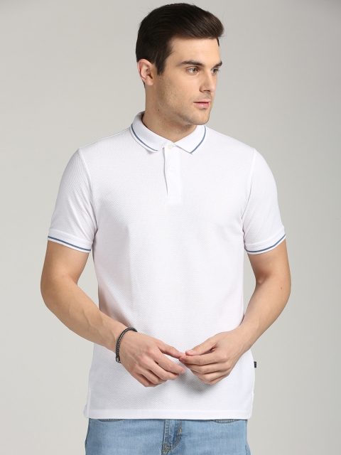 

Peter England Men White Solid Polo Collar T-shirt