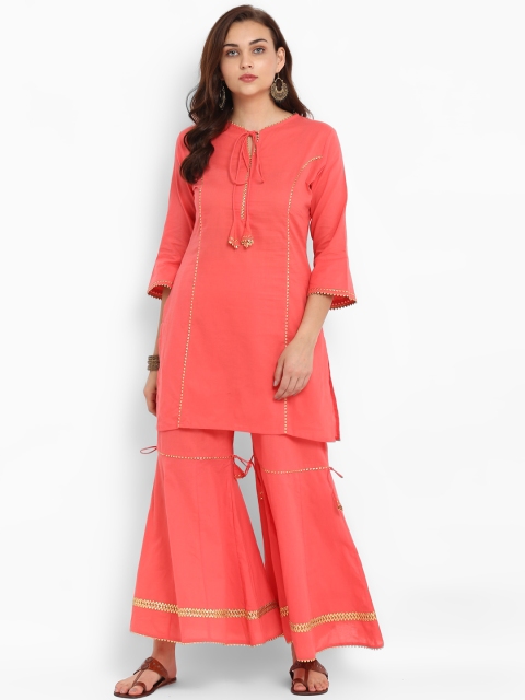 

Bhama Couture Women Peach-Coloured Solid Kurta with Palazzos