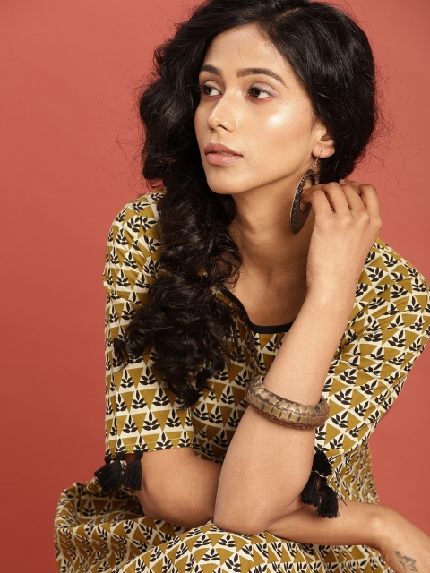 

Taavi Women Mustard Yellow & Cream-Coloured Bagru Hand Block Print Sustainable Kurta with Tassels