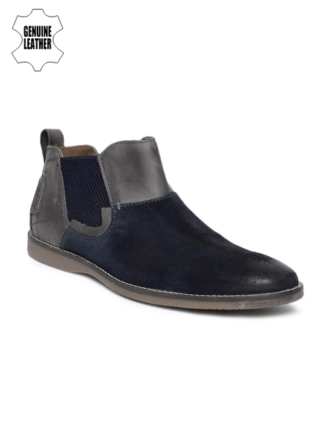 

Ruosh Men Navy Blue Solid Suede Mid-Top Flat Boots