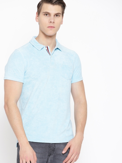 

Tommy Hilfiger Men Blue Solid Polo Collar T-shirt