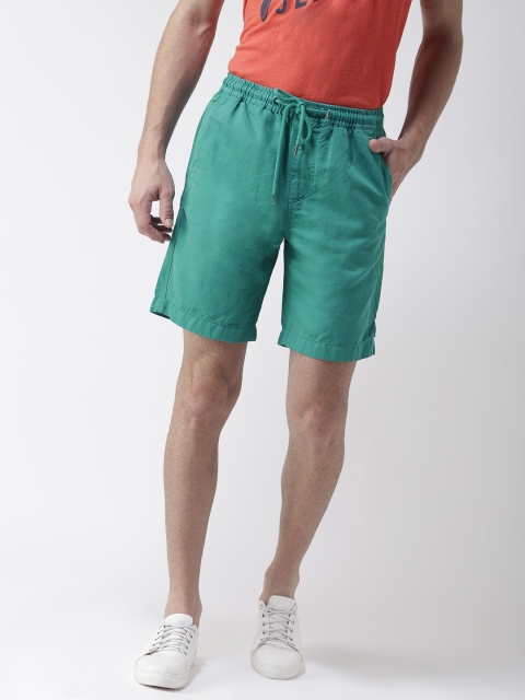 

Tommy Hilfiger Men Green Solid Regular Shorts