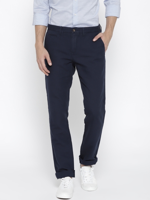 

Tommy Hilfiger Men Navy Regular Fit Solid Trousers, Navy blue