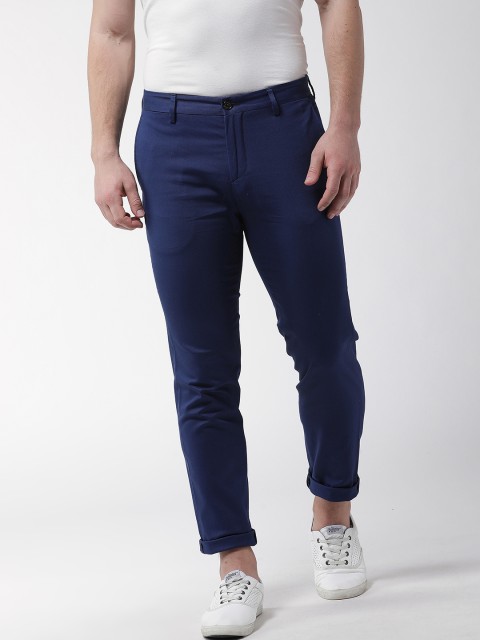 

Tommy Hilfiger Men Blue Solid Regular Fit Trousers