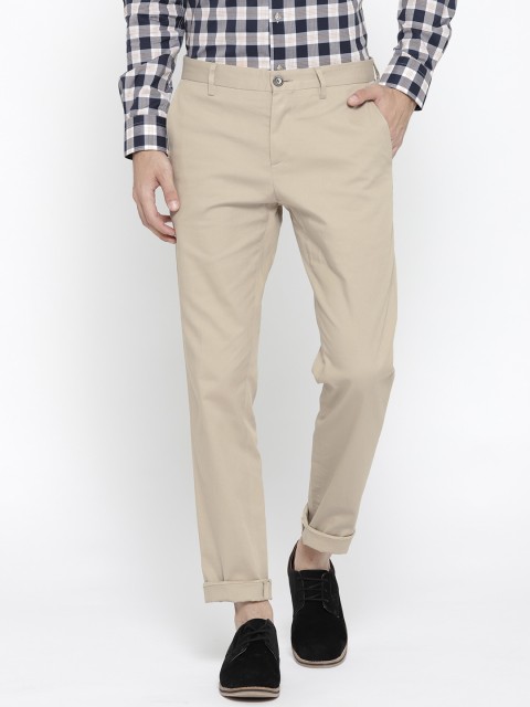 

Tommy Hilfiger Men Beige Regular Fit Solid Trousers