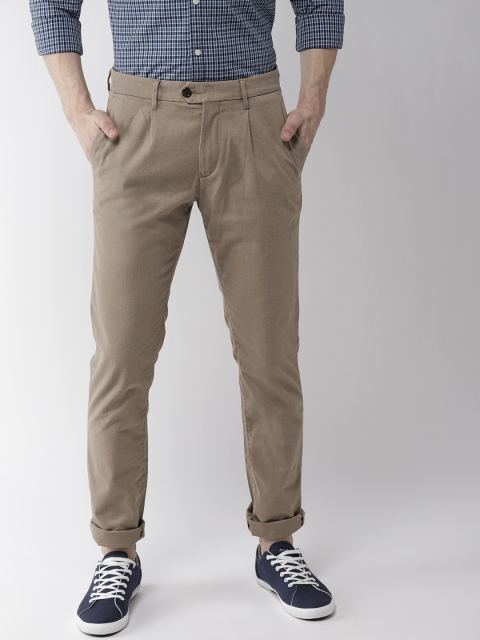 

Tommy Hilfiger Men Taupe Regular Fit Solid Trousers
