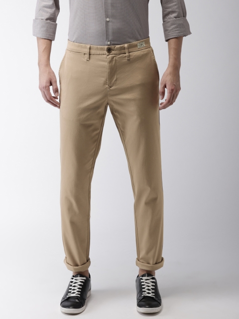 

Tommy Hilfiger Men Beige Straight Fit Solid Chinos