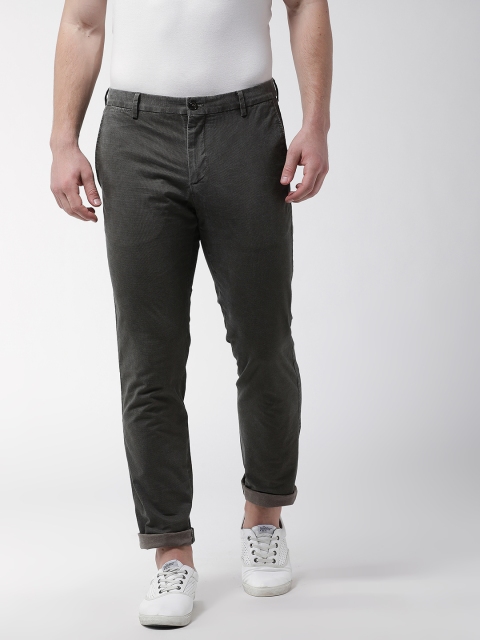 

Tommy Hilfiger Men Charcoal Grey Solid Regular Fit Trousers