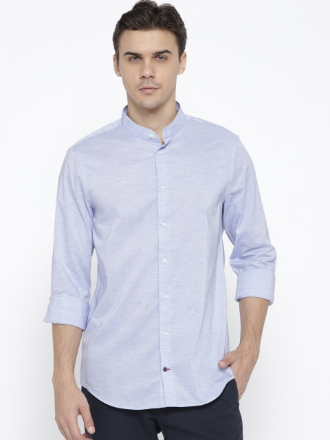 

Tommy Hilfiger Men Blue Slim Fit Solid Casual Shirt
