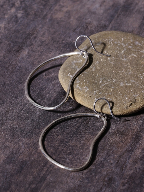 

ADORN by Nikita Ladiwala Silver-Toned Quirky Drop Earrings