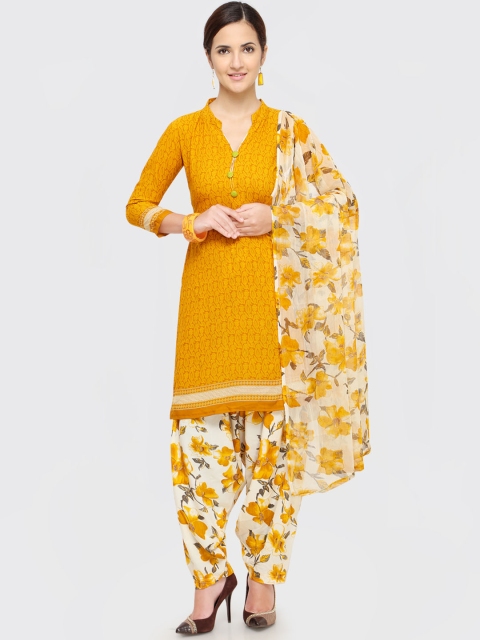

Rajnandini Mustard yellow Poly Crepe Unstitched Dress Material