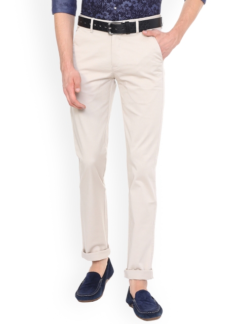 

Peter England Men Beige Slim Fit Solid Regular Trousers