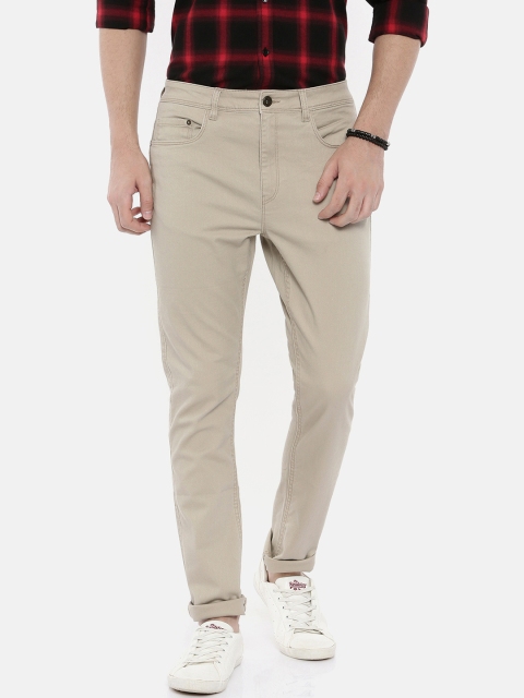 

Breakbounce Men Beige Slim Fit Solid Regular Trousers