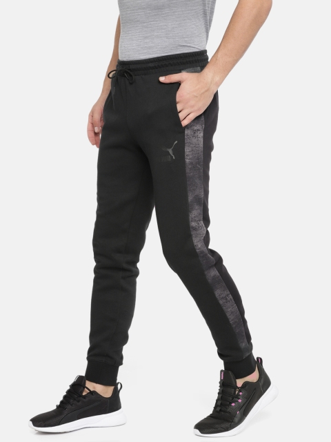 

Puma Men Black Solid Classics T7 AOP Joggers