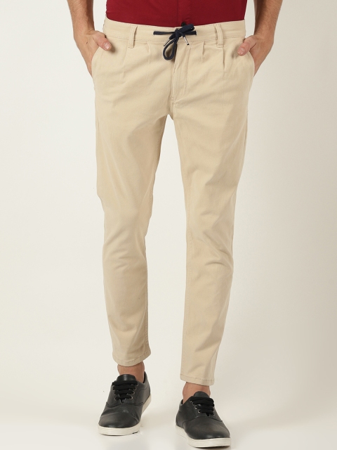 

Blue Saint Men Beige Slim Fit Solid Regular Trousers