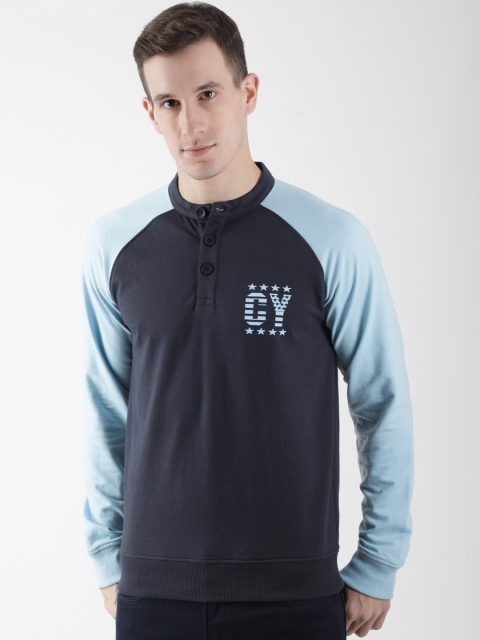

Club York Men Blue Solid Sweatshirt