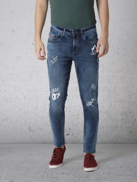 

Ecko Unltd Men Blue Slim Tapered Fit Mid-Rise Low Distress Stretchable Jeans