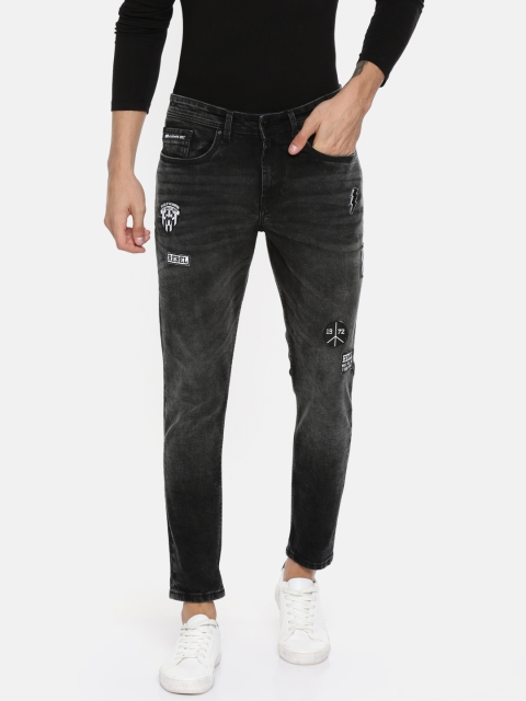 

Ecko Unltd Men Black Tapered Fit Mid-Rise Clean Look Stretchable Cropped Applique Jeans